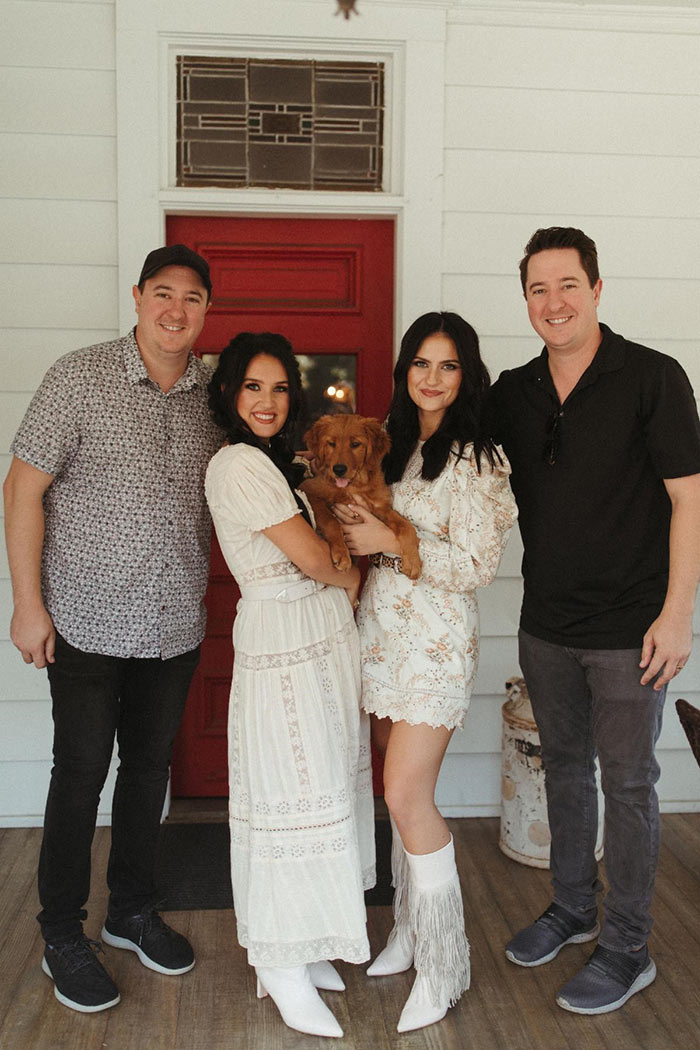 Presley & Taylor with John Edde and Matt Edde with a puppy.